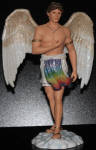 This angel is a very hard to find item. He is a favorite among gay men. He represents gay pride as Gai Angel of Pride does for the women. He is her male counterpart. The reason I didn't initially jump at the chance at getting this angel, is that he isn't smiling. He just doesn't look happy. To me, gay means happy. I will always say never say never about anything. The opportunity presented itself, and I did get this guy after all. He is a welcome addition to the collection. I have him standing with Gai on one of my curios watching over my mermen.
