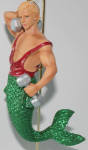 I like Mr. Mussel. He wasn't around as long as Biceps. He disappeared pretty fast after the initial run. His green tail and complexion helped me to place him with my Irish mermen for St. Patrick's Day this past year!