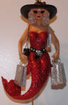 One of the truest mermaids out there. I have a sister that this mermaid represents. She shops for the latest and greatest! Of course! You got to love this one. I hope she wasn't depression shopping!