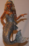 Zirconia was the mermaid counterpart to Zircon. She is a beautiful mermaid and shows that bling with class. She's Stunning to look at while hanging with the other mermaids. 