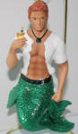 I'm not sure of the reasoning behind this merman, but this is a great piece to add to my Irish/Anglo guys. Scotch fits in with Lucky, Mr. Mussel, Tonic, Sarge, and Johnson (look at the St. Pat's Day Picture). His mermaid counterpart is Soda.