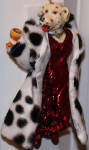 I think this is one of their best early ornaments. Dressed In Cruella was the name of the ornament when I bought it on Ebay. I rank this around the years 2000-2003. They remade it as Dottie the Dalmation later on. 