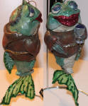 This fish is one of the funny ones. I really like his haircut and chalice in hand. The robe makes him more hysterical.