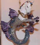 Like Bossy. this one is another stretch. But I think it's another brilliant ornament. I'm sure the shrinks would love to get the person who thought up these ornaments and analyse them to death. This one is out all year round in my house! 