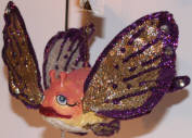 Madame Butterfly, like Angelica, looks great when you spread her fins outward. She is one of their good older ornaments. 