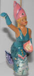 I initially was told by the former owners that this ornament was made circa 2004. I really didn't get it, because every other bendable mermaid, merman ornaments are all made circa 1998-1999. Until I get a clearer picture, I am listing Lady Shell as an early pre 2000 ornament.
